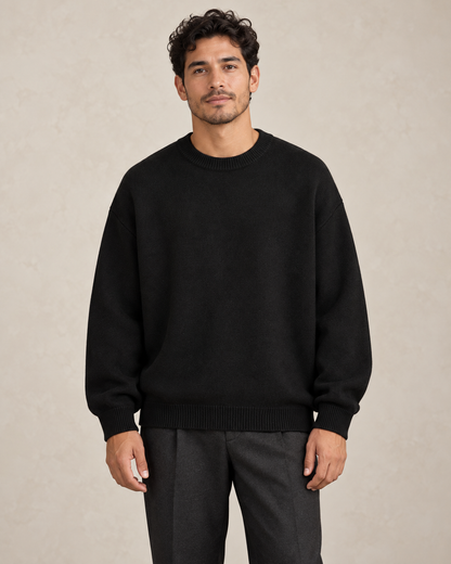 Black relaxed crewneck sweater on a model