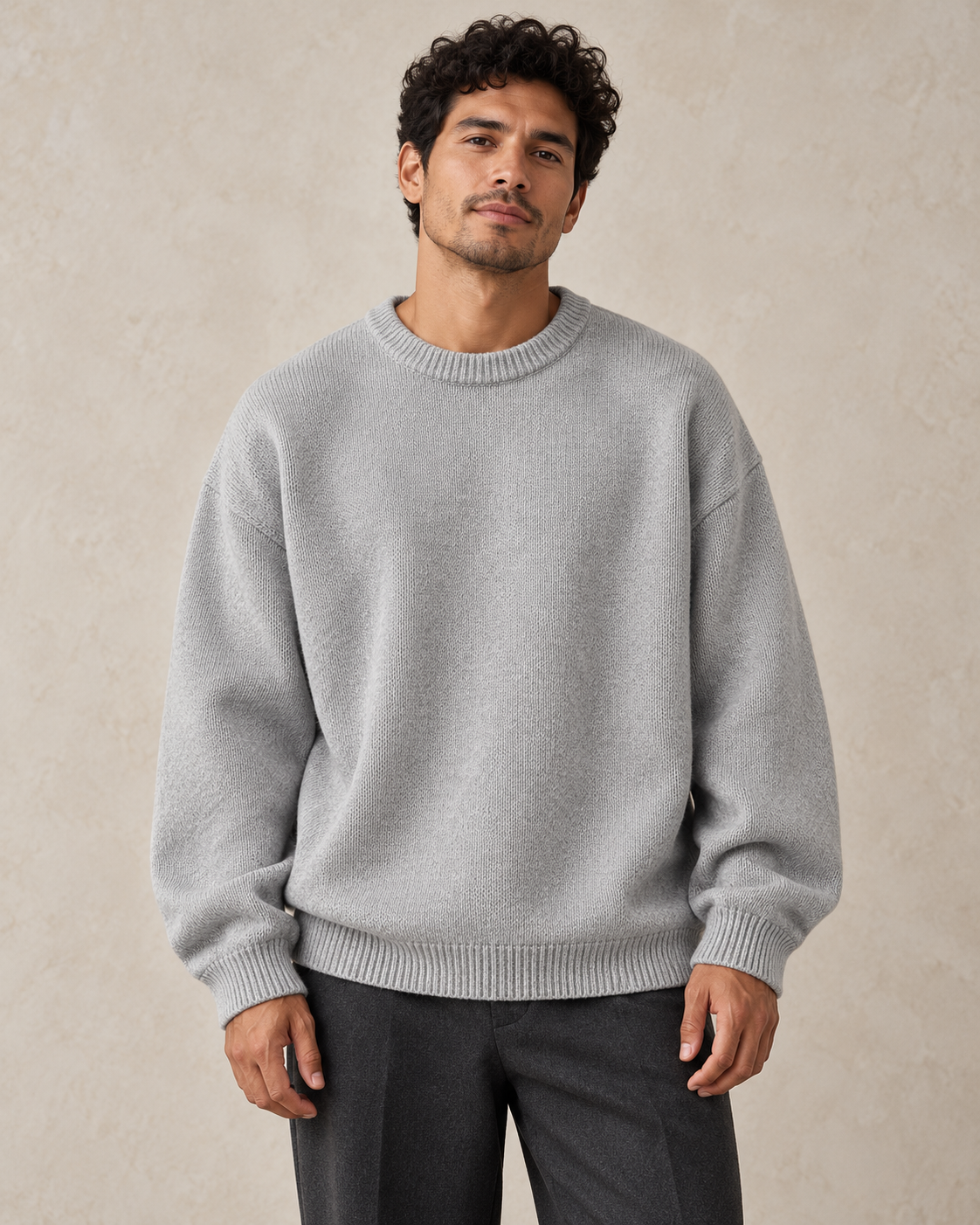 Light gray relaxed crewneck sweater on a model