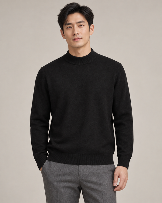 Black mock-neck sweater on a model