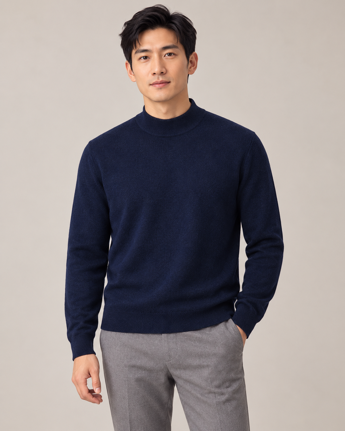 Navy blue mock-neck sweater on a model