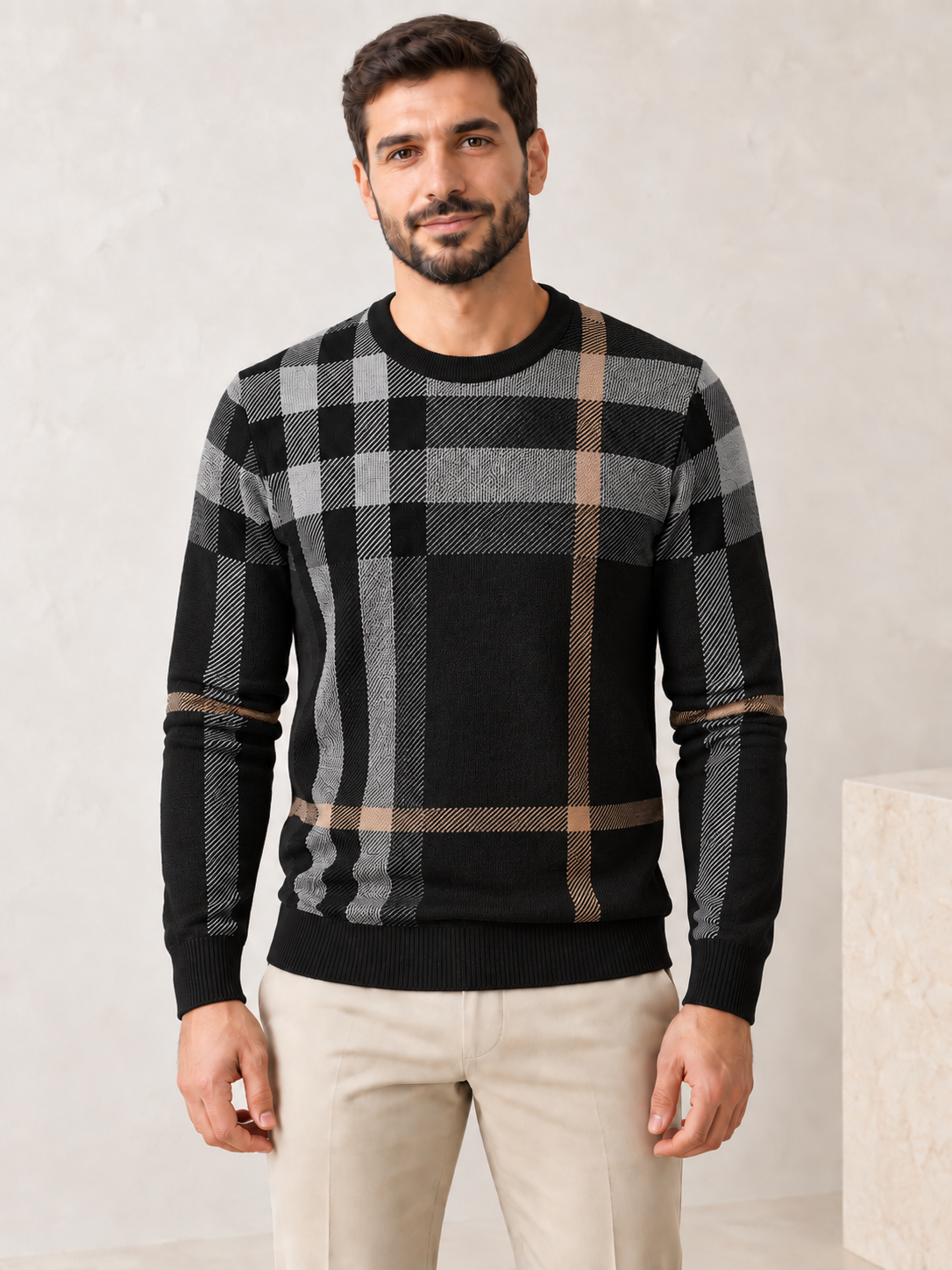 Men's black plaid knit sweater on model