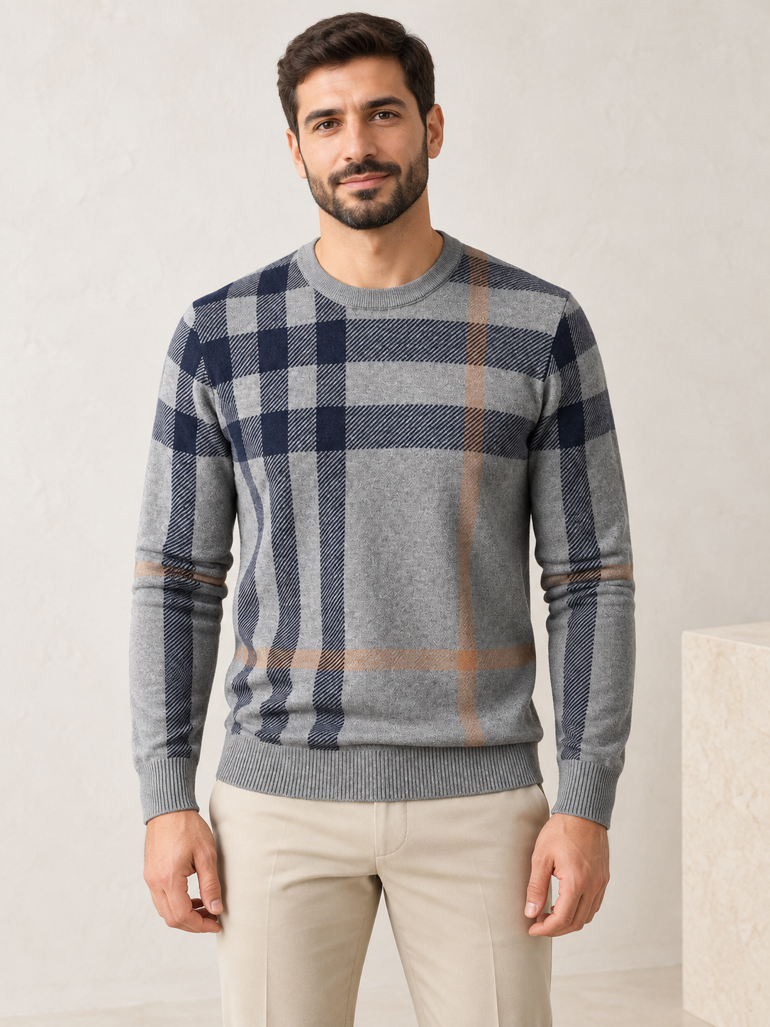 Men's gray plaid knit sweater on model