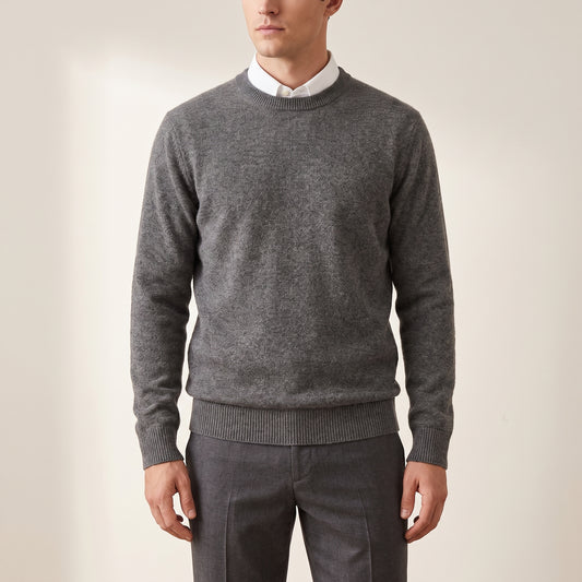 Men's grey crew-neck knit sweater worn by a model