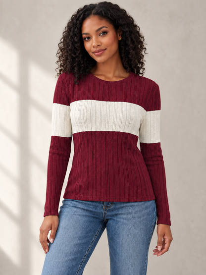 front view of female model wearing burgundy knit top with ivory contrast band