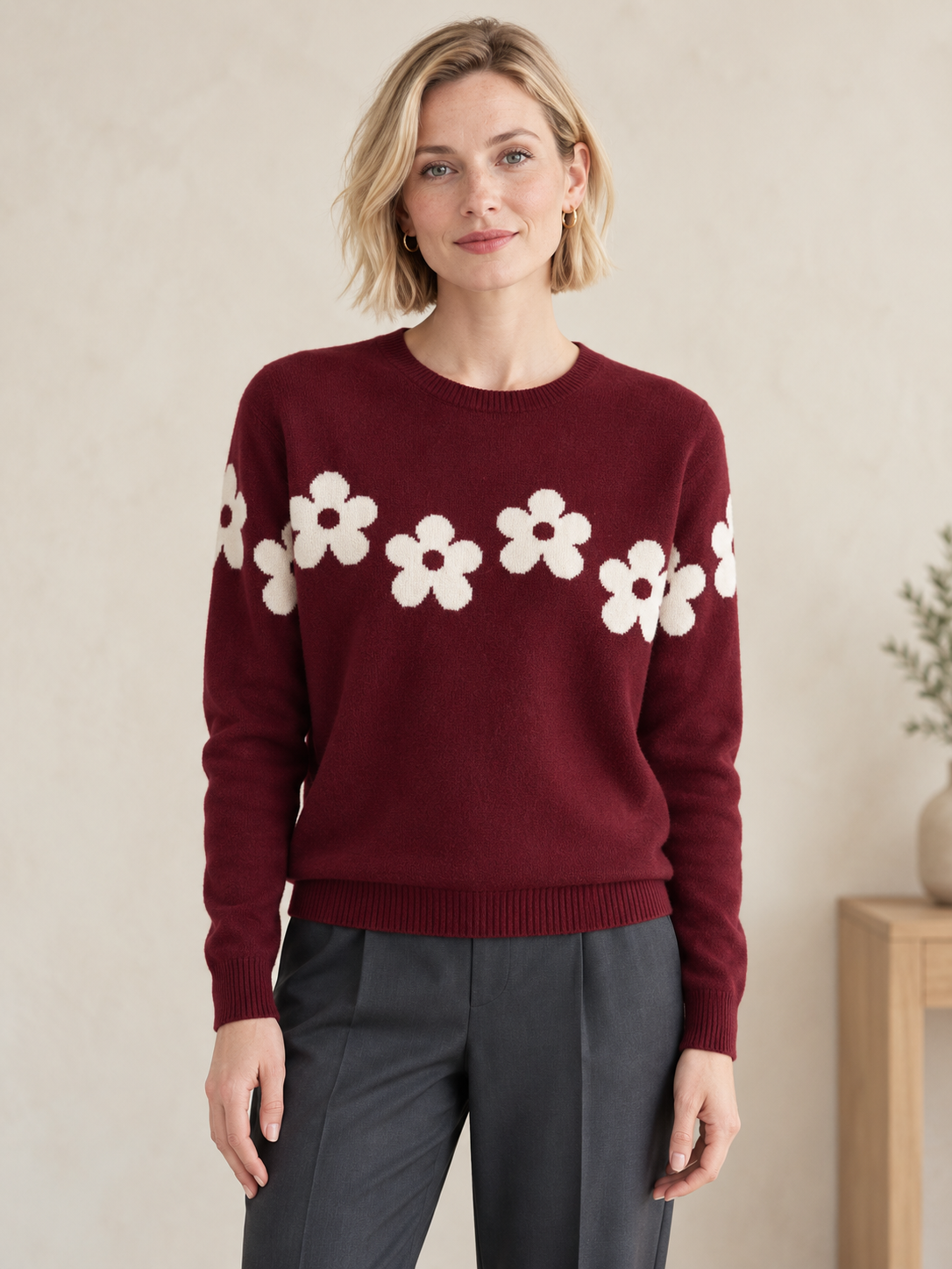 Women's maroon flower knit sweater on model