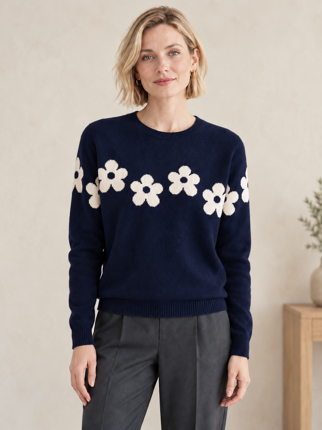 Women's navy flower knit sweater on model