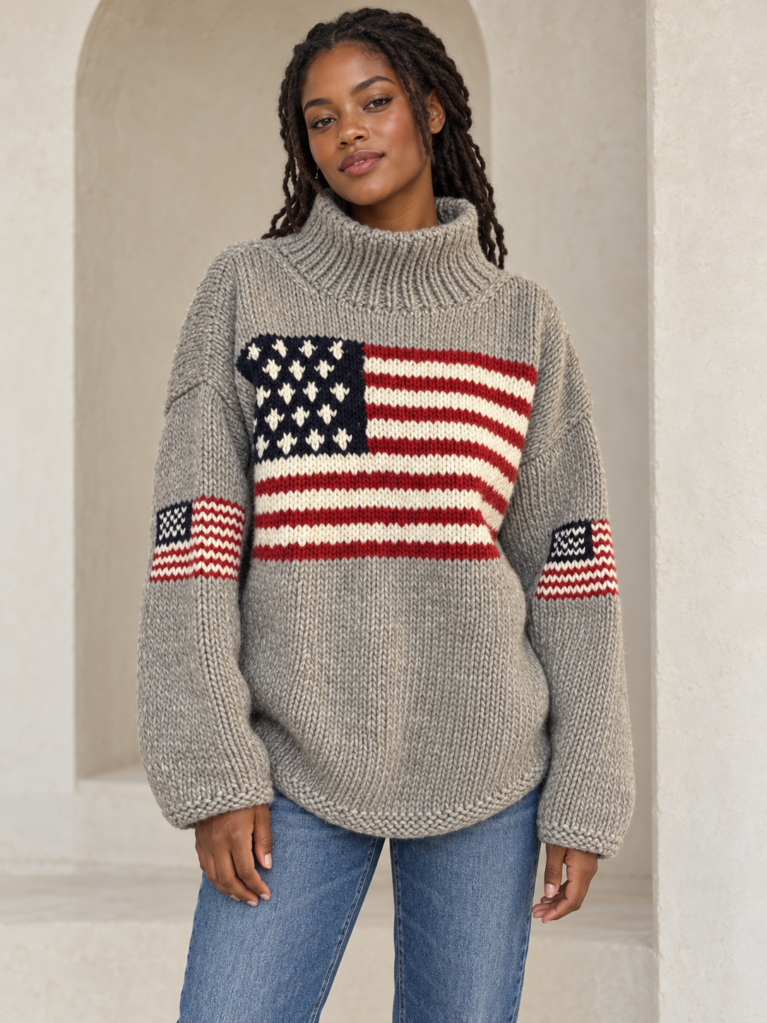 Women's gray oversized flag knit sweater on model