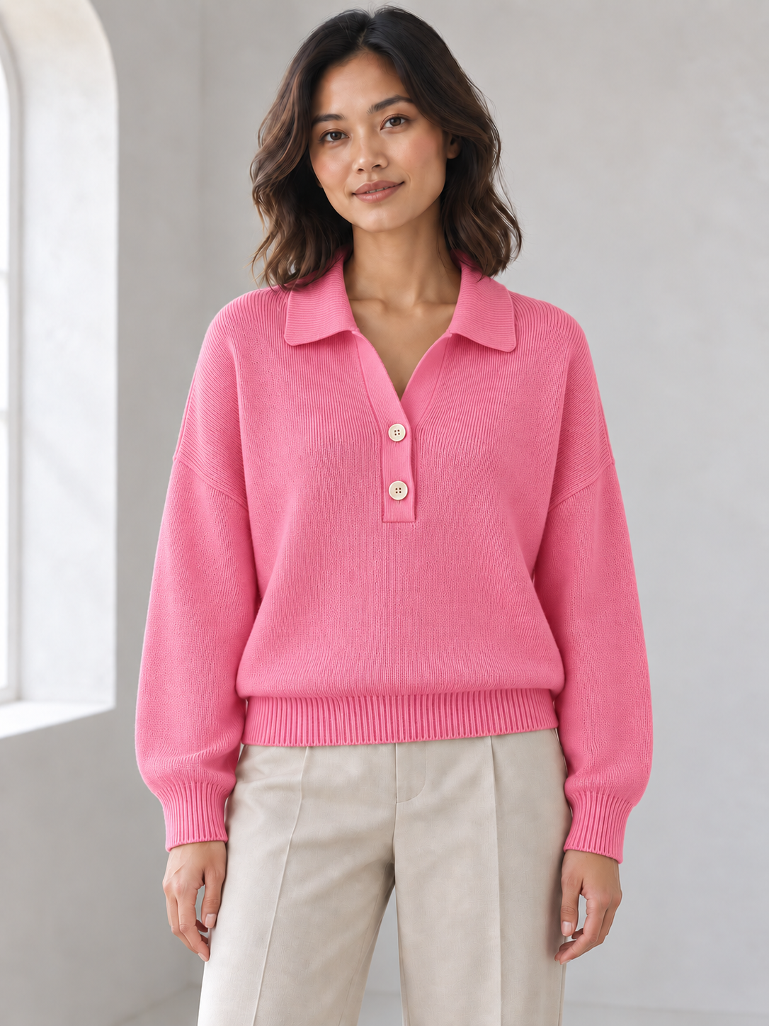 Women's rose red half-button polo sweater on model