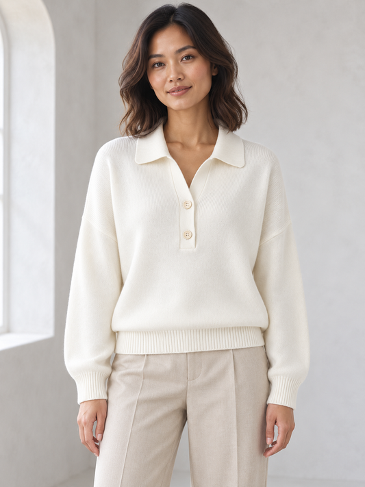 Women's white half-button polo sweater on model