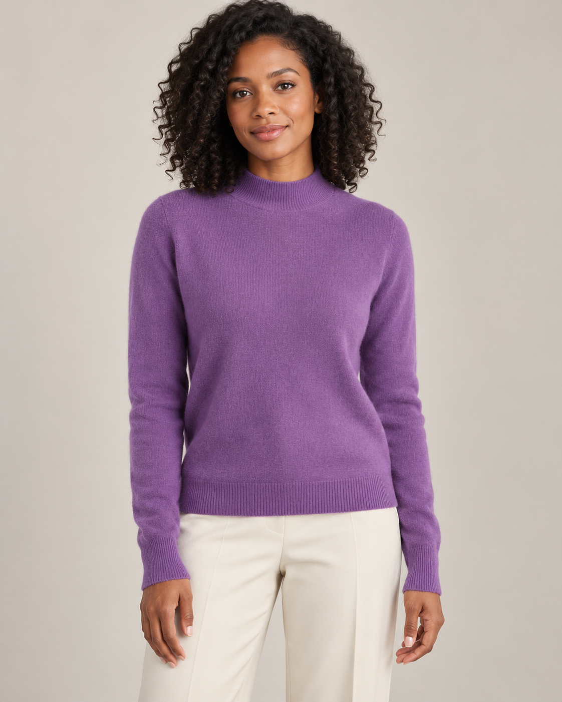 Purple mock-neck sweater on a model